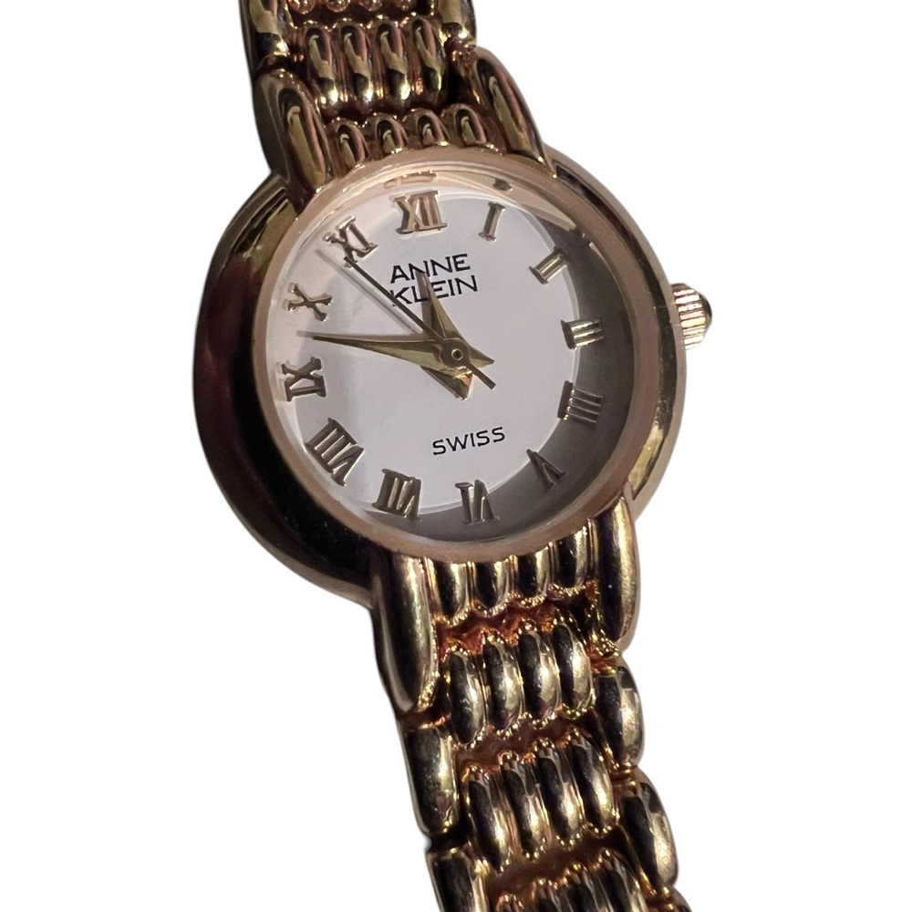 Anne Klein Gold and White Roman Numeral Bracelet Watch needs battery
